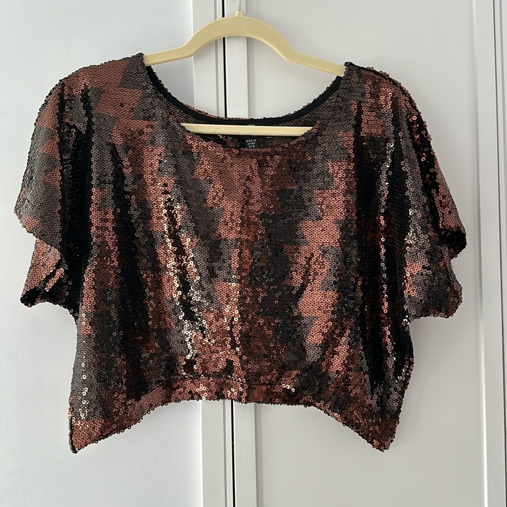 Bebe sequin top - size small. Loose fit. Bust 42” color brown